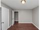 Empty bedroom featuring wood flooring and ample closet space at 1963 Shannon Ridge Ct, Decatur, GA 30032