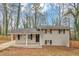 Charming, single-story house with a covered front porch, offering a welcoming entrance and great curb appeal at 1963 Shannon Ridge Ct, Decatur, GA 30032