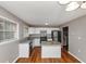Well-lit kitchen featuring stone counters, modern appliances, and white cabinets at 1963 Shannon Ridge Ct, Decatur, GA 30032