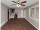 The spacious living room features hardwood floors, stairs, and a ceiling fan at 1963 Shannon Ridge Ct, Decatur, GA 30032