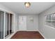 The sun room features hardwood floors and a large window at 1963 Shannon Ridge Ct, Decatur, GA 30032