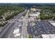 Aerial view of a highway intersection with commercial buildings at 3101 Howell Mill Nw Rd # 206, Atlanta, GA 30327