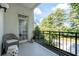 Spacious balcony overlooking trees and a quiet street at 3101 Howell Mill Nw Rd # 206, Atlanta, GA 30327