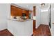 Well-equipped kitchen with wood cabinets and breakfast bar at 3101 Howell Mill Nw Rd # 206, Atlanta, GA 30327