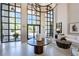Grand lobby with high ceilings, comfortable seating, and large windows at 3101 Howell Mill Nw Rd # 206, Atlanta, GA 30327