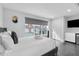 Bright bedroom with a comfortable bed, large window, and smart TV at 85 Boulevard Ne, Atlanta, GA 30312
