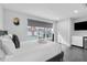Bright bedroom with a comfortable bed, large window, and smart TV at 85 Boulevard Ne, Atlanta, GA 30312