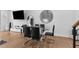 Modern dining room with glass table and black chairs at 85 Boulevard Ne, Atlanta, GA 30312