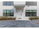 Modern front door entrance to townhome with white siding at 85 Boulevard Ne, Atlanta, GA 30312