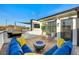 Spacious rooftop deck with seating, fire pit, and grill at 85 Boulevard Ne, Atlanta, GA 30312