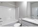Bathroom with shower/tub combo and granite countertop at 11821 Rizvan Pl, Covington, GA 30014