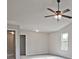 Bedroom with carpeted floor and vaulted ceiling at 11821 Rizvan Pl, Covington, GA 30014