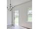 Dining room with hardwood floors and access to backyard at 11821 Rizvan Pl, Covington, GA 30014