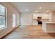 Kitchen with white cabinets, stainless steel appliances, and island at 11821 Rizvan Pl, Covington, GA 30014
