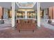 Building entrance with fountain and seating area at 130 26Th Nw St # 804, Atlanta, GA 30309