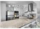 Updated kitchen featuring granite countertops and stainless steel appliances at 130 26Th Nw St # 804, Atlanta, GA 30309