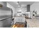 Modern kitchen with stainless steel appliances and granite countertops at 130 26Th Nw St # 804, Atlanta, GA 30309