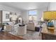 Bright and airy living room featuring hardwood floors and ample natural light at 130 26Th Nw St # 804, Atlanta, GA 30309