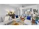Open concept living room and kitchen with hardwood floors and stylish furnishings at 130 26Th Nw St # 804, Atlanta, GA 30309