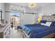 Main bedroom with a king-size bed and access to a private balcony at 130 26Th Nw St # 804, Atlanta, GA 30309