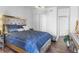 Spacious main bedroom with ample closet space and plush carpeting at 130 26Th Nw St # 804, Atlanta, GA 30309