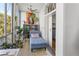 Sunroom with ample natural light and relaxing seating area at 130 26Th Nw St # 804, Atlanta, GA 30309
