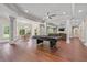 Open concept basement with pool table and kitchen at 2832 Springbluff Ln, Buford, GA 30519
