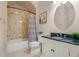Clean bathroom with a shower/tub combo and granite vanity at 2832 Springbluff Ln, Buford, GA 30519