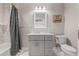 Well-appointed bathroom with marble vanity and shower/tub combo at 2832 Springbluff Ln, Buford, GA 30519