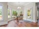 Cozy breakfast nook with bay windows and hardwood floors at 2832 Springbluff Ln, Buford, GA 30519