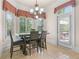 Breakfast nook with built-in seating and access to backyard at 2832 Springbluff Ln, Buford, GA 30519
