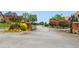 Gated community entrance with landscaping and brick pillars at 2832 Springbluff Ln, Buford, GA 30519