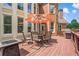Relaxing deck with patio furniture and built-in grill, perfect for outdoor entertaining at 2832 Springbluff Ln, Buford, GA 30519