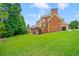 Brick home with large backyard and expansive deck at 2832 Springbluff Ln, Buford, GA 30519