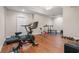 Home gym with Peloton bike, treadmill, and weight equipment at 2832 Springbluff Ln, Buford, GA 30519