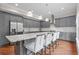 Modern kitchen featuring granite countertops and gray cabinetry at 2832 Springbluff Ln, Buford, GA 30519