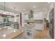 Spacious kitchen with granite countertops, island and breakfast nook at 2832 Springbluff Ln, Buford, GA 30519
