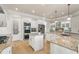 Island kitchen with stainless steel appliances and granite countertops at 2832 Springbluff Ln, Buford, GA 30519