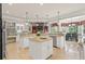 Large kitchen with an island, granite countertops and stainless steel appliances at 2832 Springbluff Ln, Buford, GA 30519