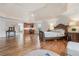 Luxurious main bedroom with hardwood floors and private sitting area at 2832 Springbluff Ln, Buford, GA 30519