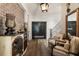 Elegant hallway with rustic furniture and hardwood floors at 4874 Kettle River Pt, Suwanee, GA 30024