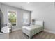 Cozy bedroom with a twin bed, window with blinds and a TV at 113 Overlook Ridge Way, Canton, GA 30114