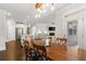 Dining room with hardwood floors and view into kitchen at 113 Overlook Ridge Way, Canton, GA 30114
