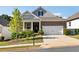 Brick and shingle ranch home with two-car garage and landscaped yard at 113 Overlook Ridge Way, Canton, GA 30114