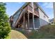 Two-story home with deck and backyard at 113 Overlook Ridge Way, Canton, GA 30114