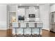 Modern kitchen with white cabinets, granite counters, and island at 113 Overlook Ridge Way, Canton, GA 30114