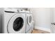 Convenient laundry room with side-by-side washer and dryer at 113 Overlook Ridge Way, Canton, GA 30114