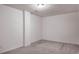 Spacious unfinished basement room with carpeted floor at 2709 Richmond Row Dr, Suwanee, GA 30024