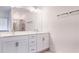 Main bathroom with double vanity and large mirror at 2709 Richmond Row Dr, Suwanee, GA 30024