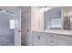 Main bathroom with double vanity and access to bedroom at 2709 Richmond Row Dr, Suwanee, GA 30024
